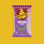 Bag of Rosemary Harmonic Chips surrounded by fresh rosemary sprigs and rustic wood background