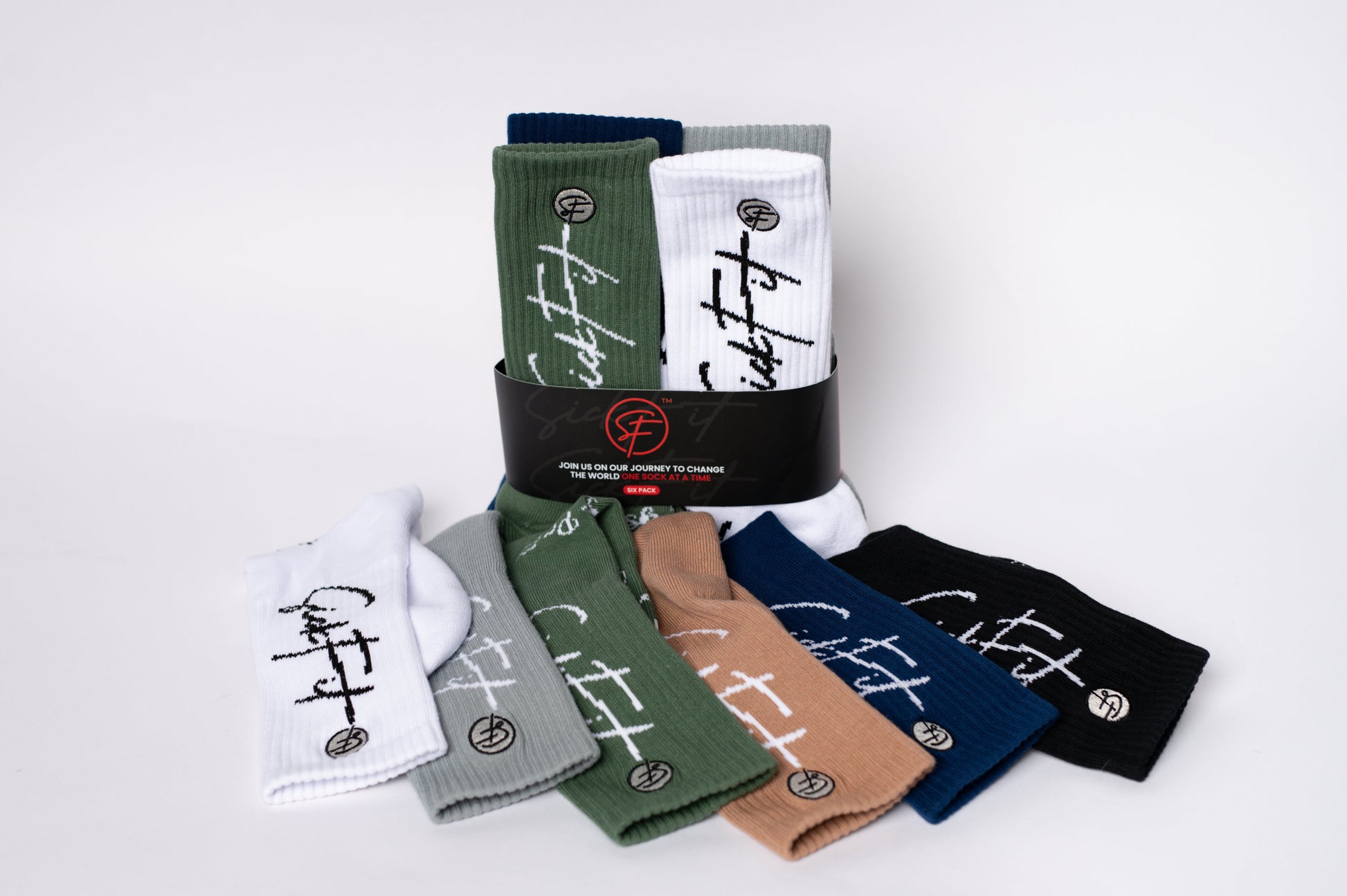 Set of colorful crew compression socks with branding on a white background