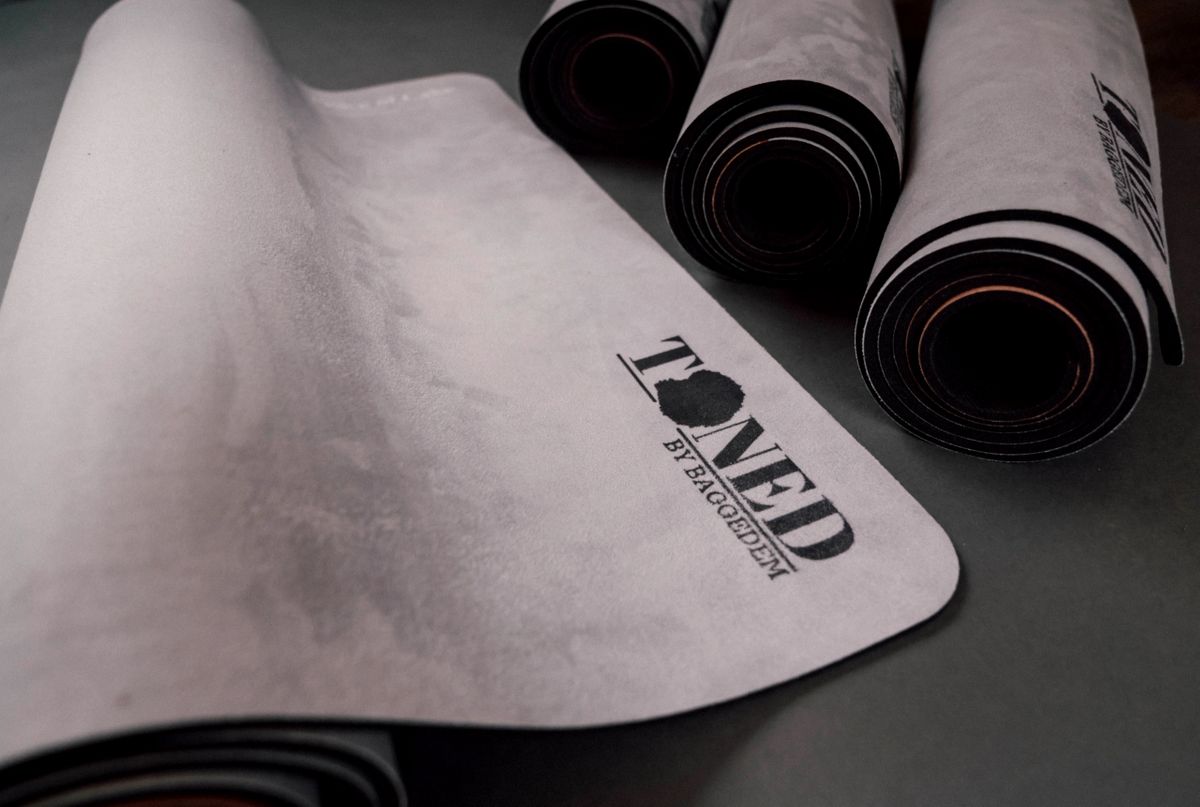 Custom made yoga mat design - 'Toned by Baggedem' brand logo